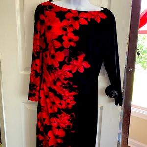 Beautiful Ralph Lauren light weight dress, below the knee, mid-length sleeves.